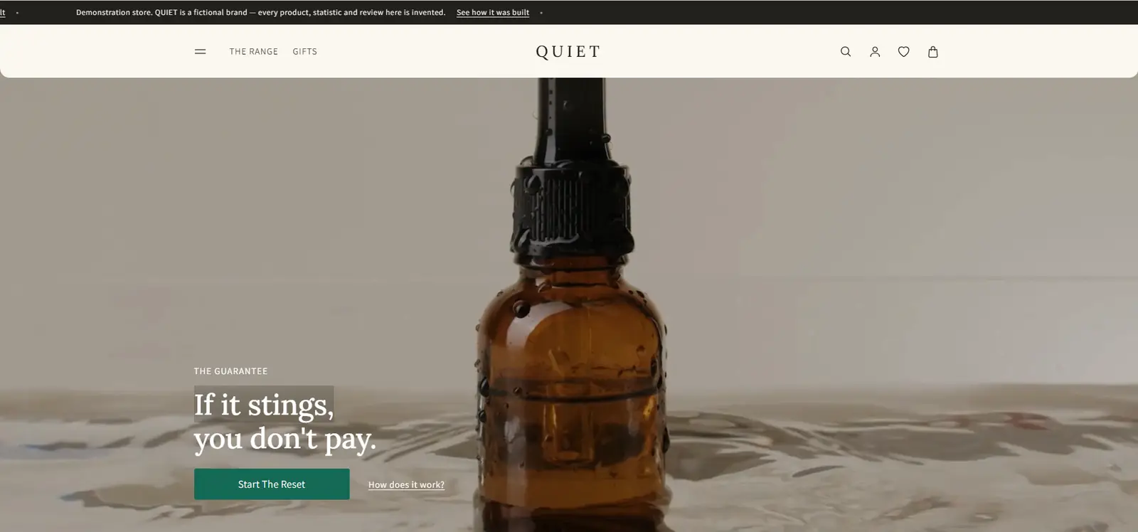 The QUIET home page: an amber dropper bottle standing in water, under the heading "If it stings, you don’t pay." and a Start The Reset button.